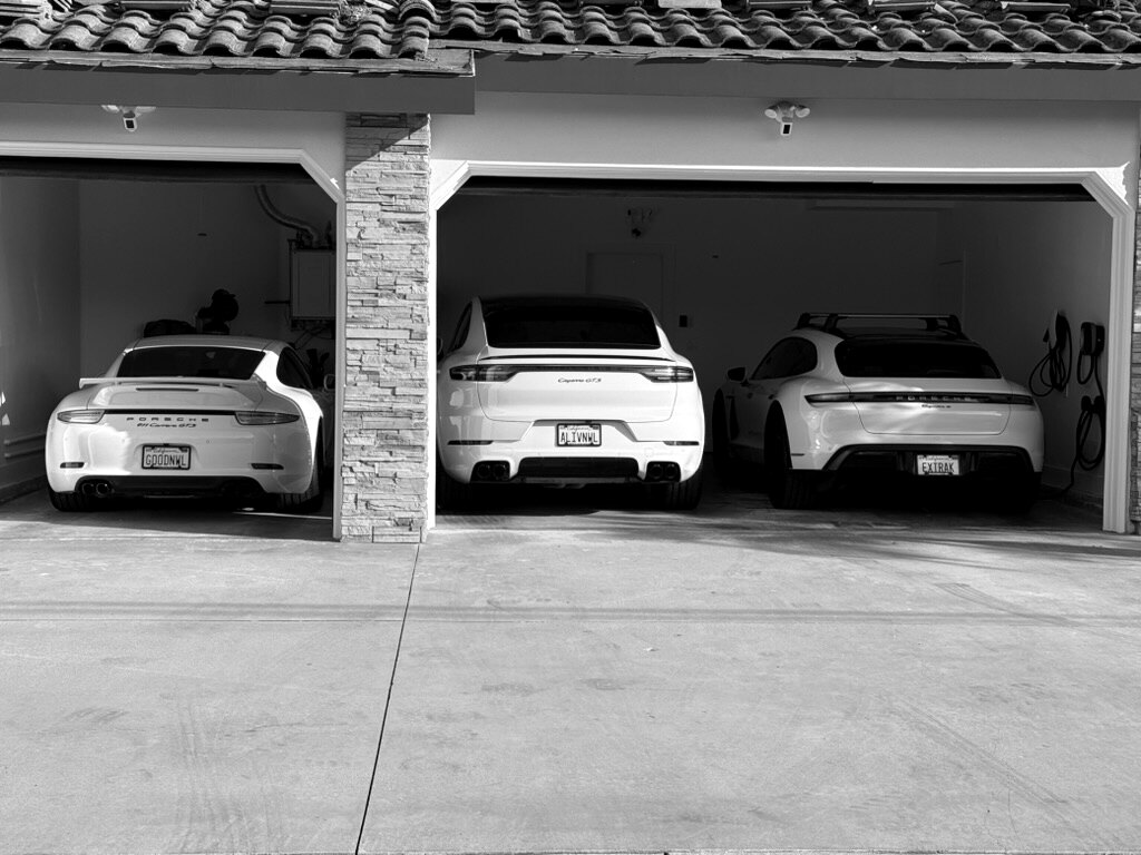 Three Porsches in a private garage