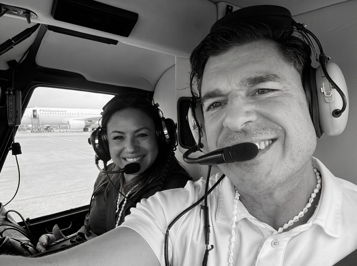 Crispin Luna IV and partner in a helicopter cockpit